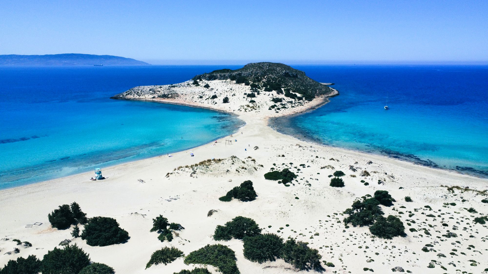 White Cycladic village above the Aegean Sea