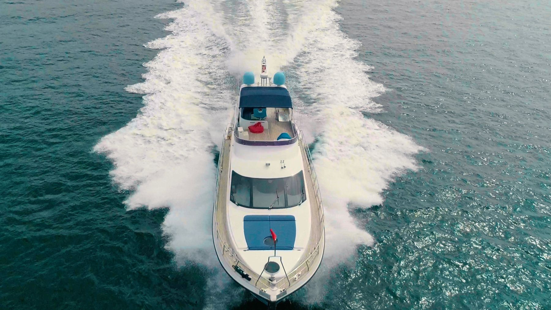 Elegant sailing yacht moving across calm Mediterranean water